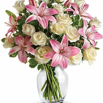 <div class="m-pdp-tabs-description">
<div id="mark-3" class="m-pdp-tabs-marketing-description">A romantic gift like this one is always appreciated. An eye-catching display of roses and lilies is perfectly arranged in a feminine vase which makes a beautiful and lasting impression.</div>
</div>
<p id="arrngDescp">Elegant white roses and sweet pink asiatic lilies are hand-arranged with greens. It's the perfect way to show you love them always and forever.</p>
